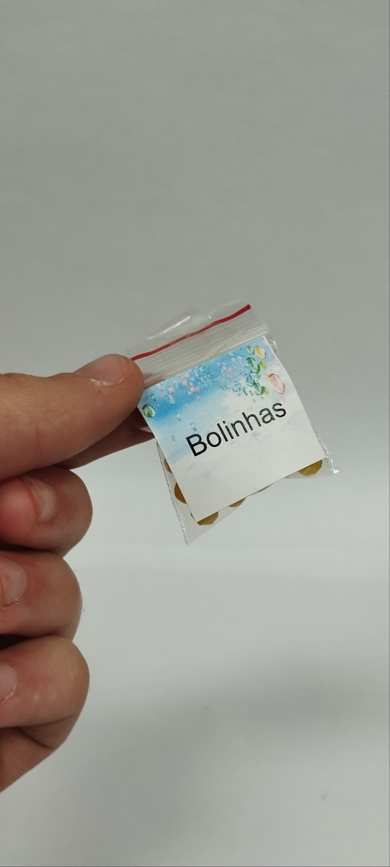 01 pacote bolinhas plásticas